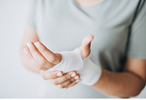A person receiving medical attention on a boat, representing bodily injury or death coverage.